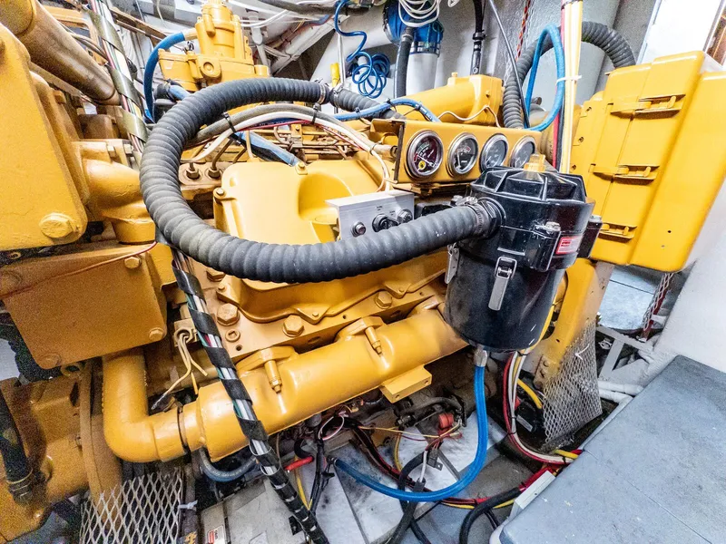 Slide: The Image of Engine room of 1986 Custom Expedition Vessel 58 with complex machinery and gauges. - 31