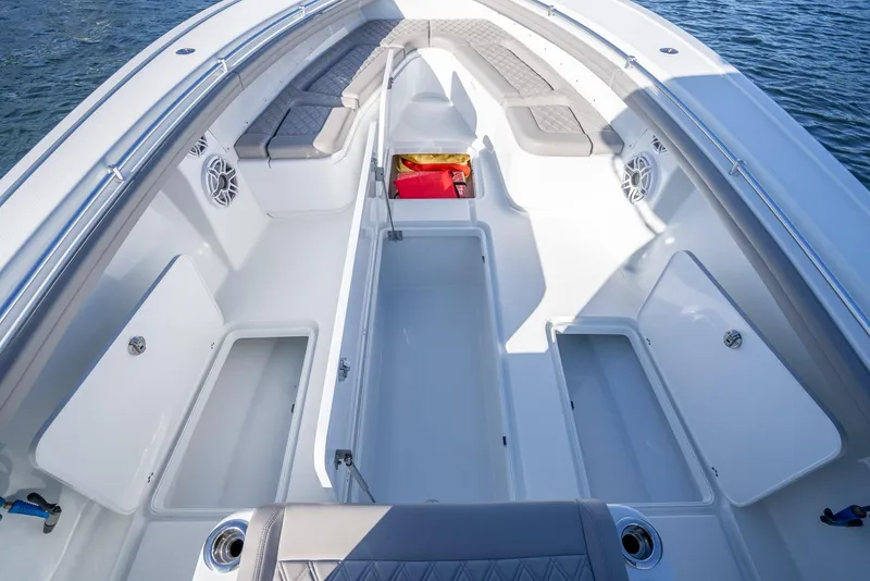 Slide: The Image of 2023 Yellowfin 36 boat interior with seating and storage compartments. - 39