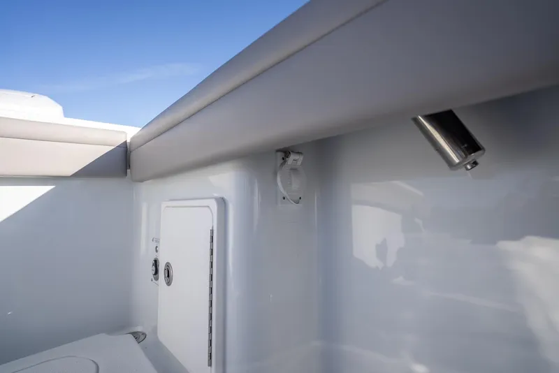 Slide: The Image of 2023 Yellowfin 36 boat interior with storage compartment and sleek design. - 48