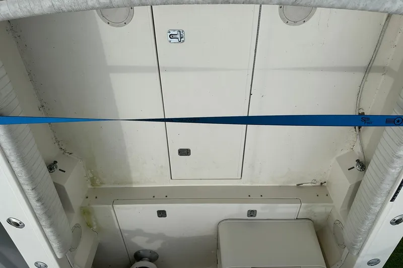 Slide: The Image of 2003 Albemarle 268 Express Fisherman boat interior with storage compartments. - 19