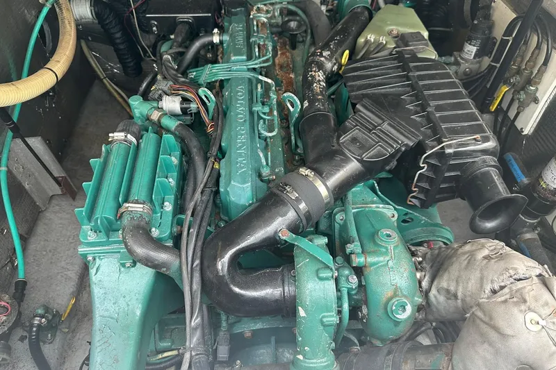 Slide: The Image of Engine of 2003 Albemarle 268 Express Fisherman boat, featuring Volvo Penta components. - 26