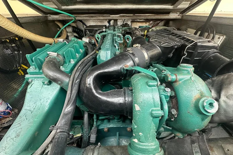 Slide: The Image of Engine compartment of a 2003 Albemarle 268 Express Fisherman boat, showcasing detailed components. - 27
