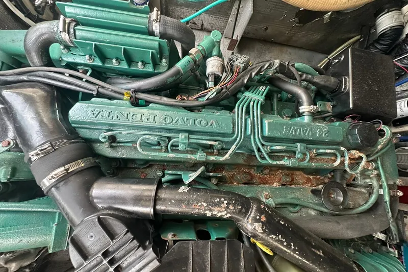 Slide: The Image of Engine of a 2003 Albemarle 268 Express Fisherman boat, featuring Volvo Penta components. - 28