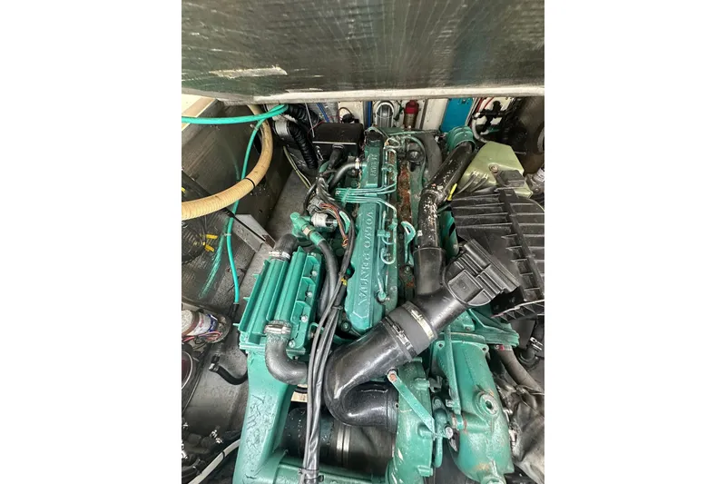 Slide: The Image of Engine compartment of a 2003 Albemarle 268 Express Fisherman boat. - 29