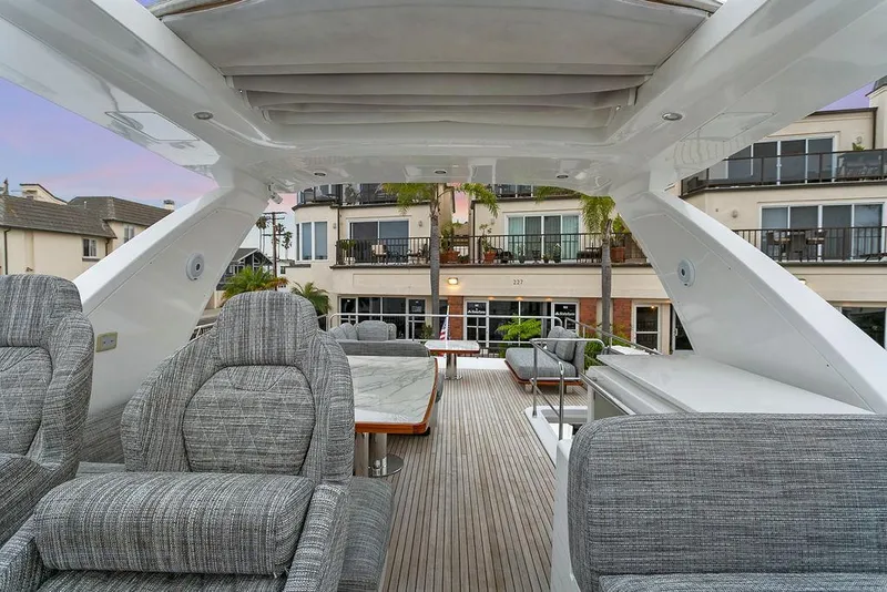 Slide: The Image of Luxurious 2020 Azimut 66 yacht interior with plush seating and modern design. - 10