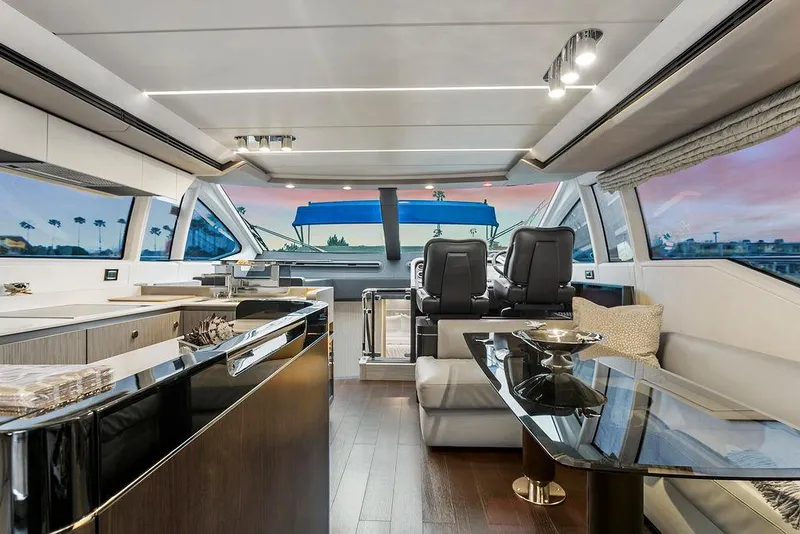 Slide: The Image of Luxurious interior of 2020 Azimut 66 yacht with modern furnishings and panoramic windows. - 15