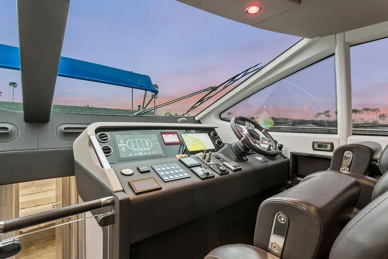 Slide: The Image of Cockpit of 2020 Azimut 66 yacht with modern controls and panoramic view. - 17