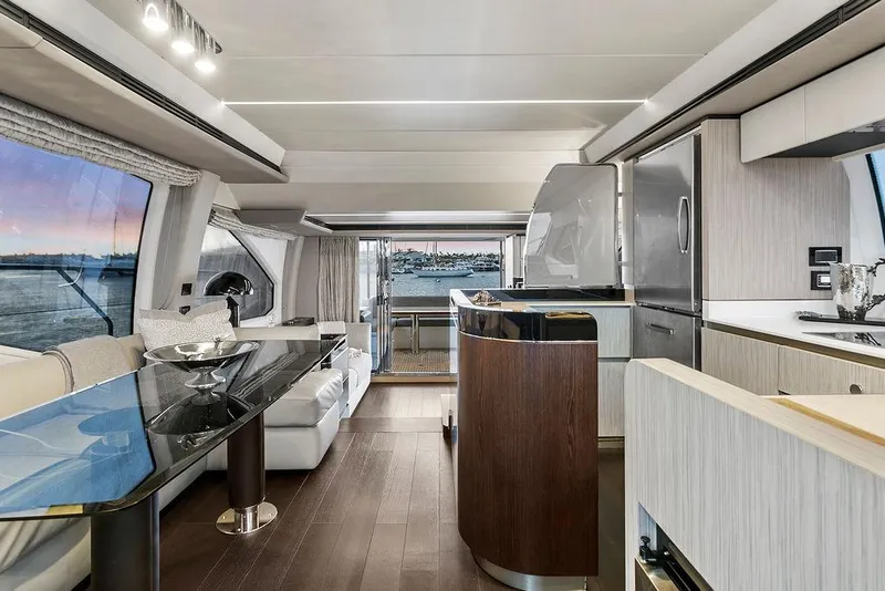 Slide: The Image of Luxurious interior of a 2020 Azimut 66 yacht with modern kitchen and dining area. - 19