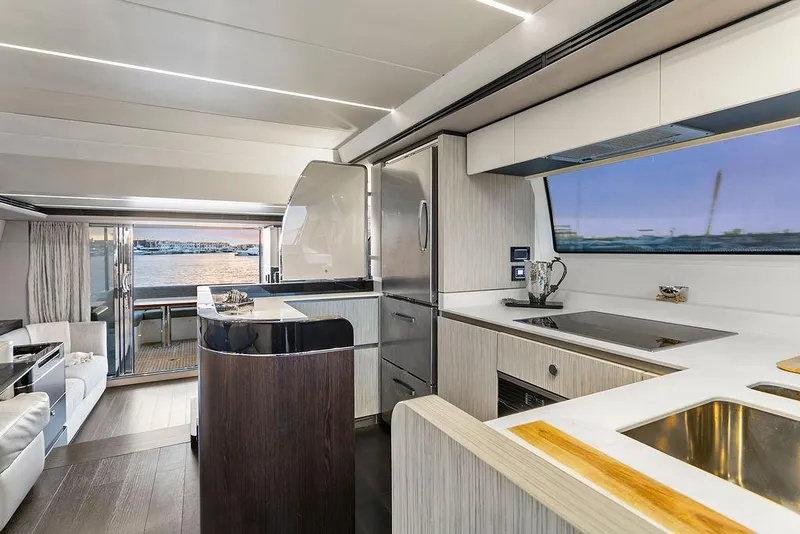 Slide: The Image of Luxurious interior of 2020 Azimut 66 yacht with modern kitchen and scenic view. - 22