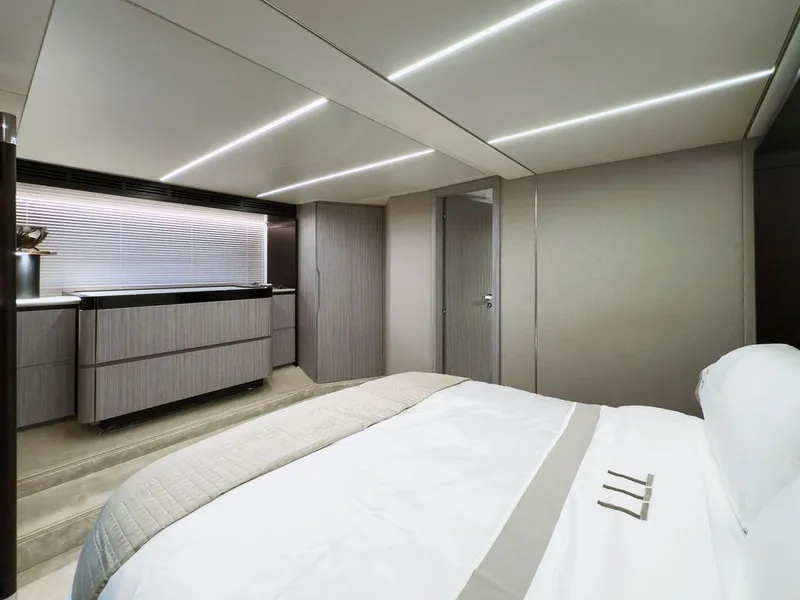 Slide: The Image of Luxurious bedroom interior of 2020 Azimut 66 yacht, featuring modern design and elegant furnishings. - 26