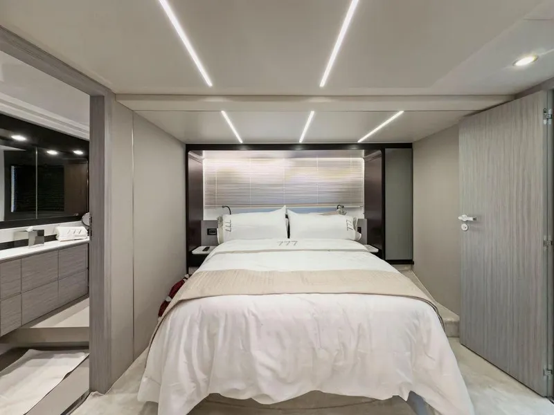 Slide: The Image of Luxurious bedroom interior of 2020 Azimut 66 yacht with modern design and ambient lighting. - 27