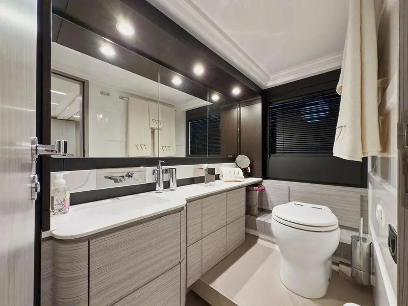 Slide: The Image of Luxurious bathroom interior of 2020 Azimut 66 yacht with modern fixtures and elegant design. - 28