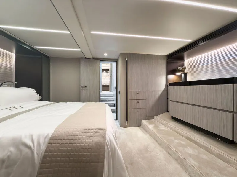 Slide: The Image of Luxurious bedroom interior of 2020 Azimut 66 yacht, featuring modern design and elegant furnishings. - 29
