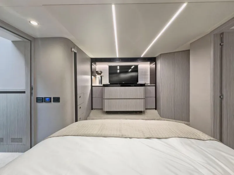 Slide: The Image of Luxurious bedroom interior of 2020 Azimut 66 yacht with modern design and TV. - 30
