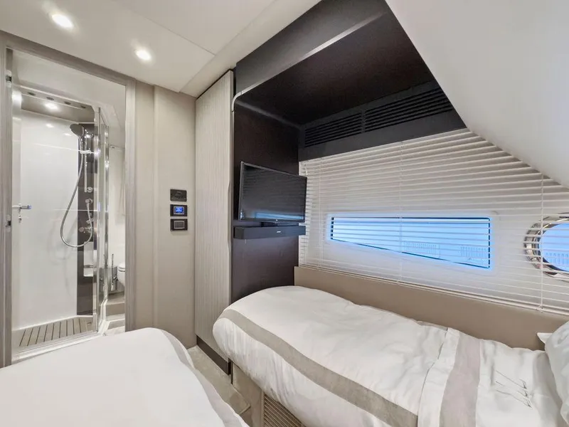 Slide: The Image of Luxurious cabin interior of 2020 Azimut 66 yacht with modern amenities and sleek design. - 32