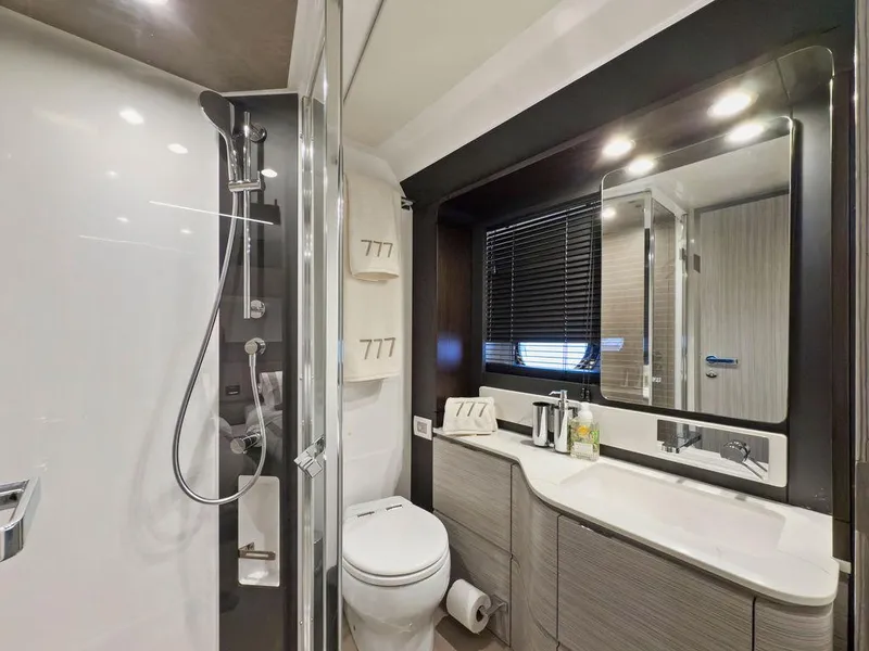 Slide: The Image of Luxurious bathroom in 2020 Azimut 66 yacht with modern fixtures and elegant design. - 33