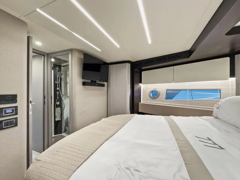 Slide: The Image of Luxurious interior of 2020 Azimut 66 yacht bedroom with modern design and ambient lighting. - 36