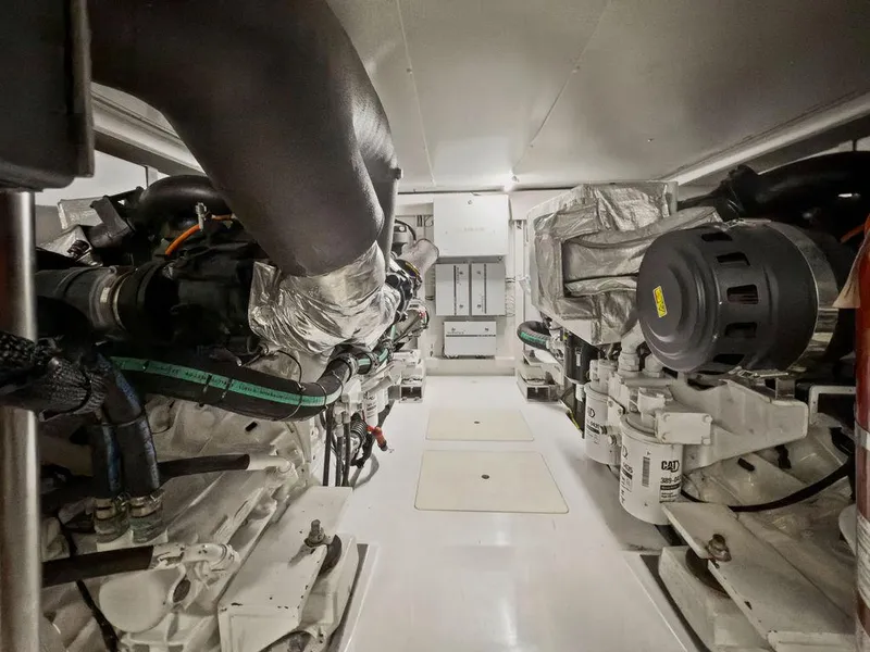 Slide: The Image of Engine room of a 2020 Azimut 66 yacht, showcasing advanced machinery and components. - 37