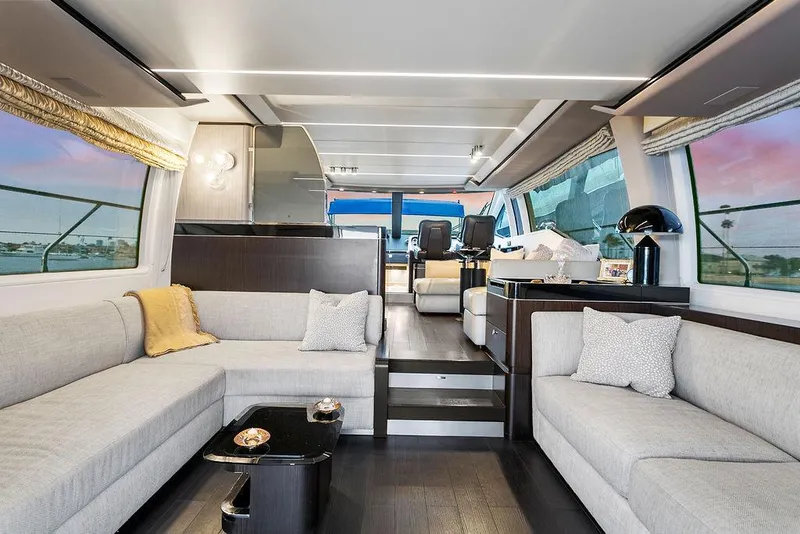 Slide: The Image of Luxurious interior of a 2020 Azimut 66 yacht with modern furnishings and panoramic windows. - 4