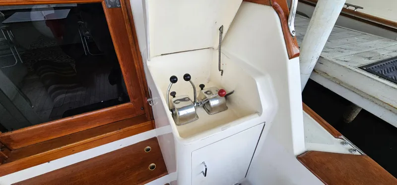 Slide: The Image of Luxurious interior of 1987 Ocean Yachts 48 Super Sport with plush seating and elegant decor. - 19