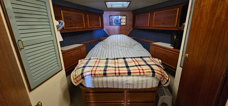 Slide: The Image of Bathroom interior of 1987 Ocean Yachts 48 Super Sport, featuring sink and toilet. - 34