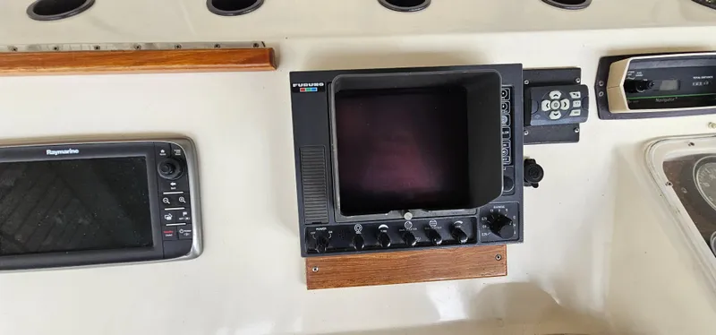 Slide: The Image of Control panel of a 1987 Ocean Yachts 48 Super Sport boat with gauges and instruments. - 49