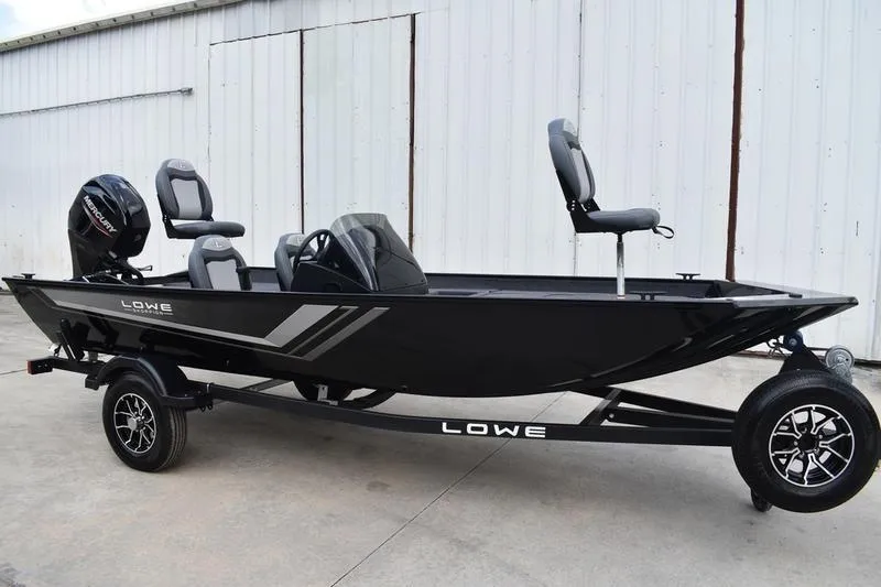 Slide: The Image of ProMariner 10 Amp marine battery charger on Lowe Skorpion 17, 2025 model. - 2