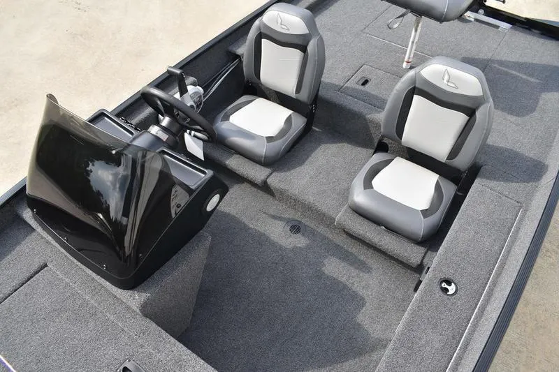 Slide: The Image of 2025 Lowe Skorpion 17 boat interior with dual seats and steering console. - 23