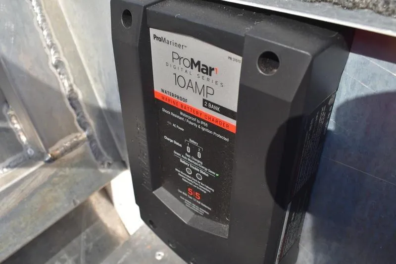 Slide: The Image of Close-up of a 2025 Lowe Skorpion 17 Rambler tire with black alloy wheel. - 3