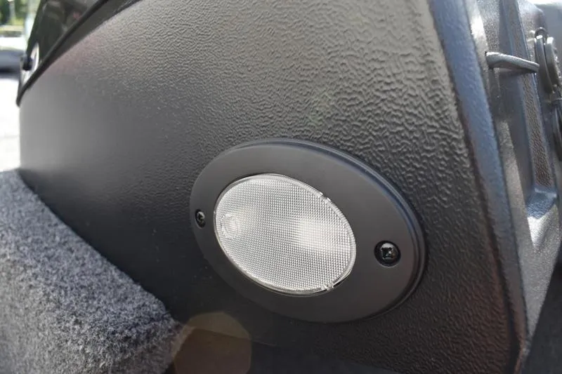 Slide: The Image of USB and 12V charging ports on 2025 Lowe Skorpion 17 boat dashboard. - 30