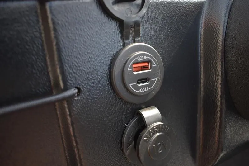 Slide: The Image of Gray and white seat on 2025 Lowe Skorpion 17 boat deck. - 31