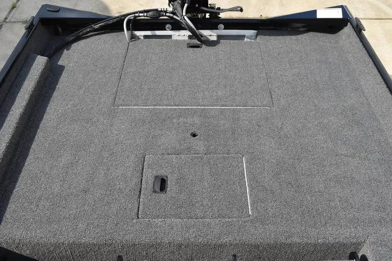 Slide: The Image of Control panel of 2025 Lowe Skorpion 17 boat with switches and horn button. - 33