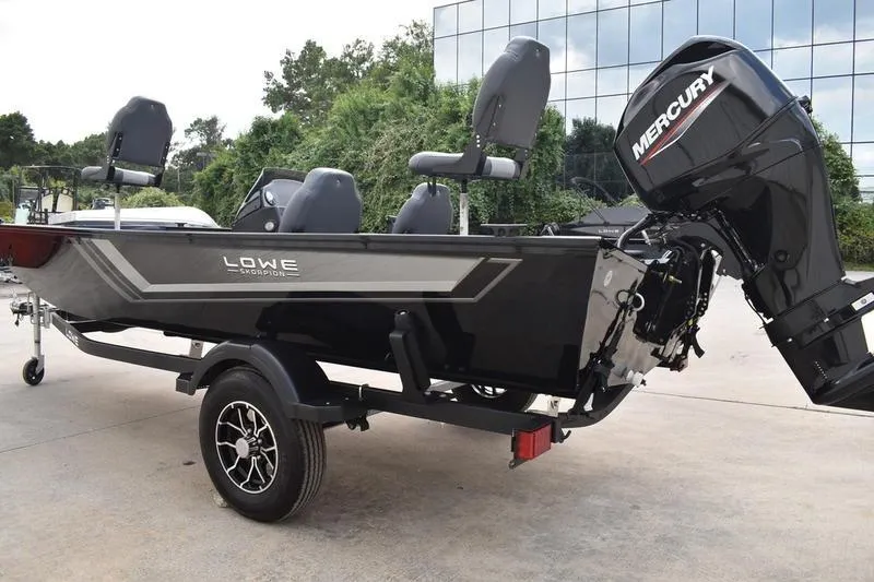 Slide: The Image of 2025 Lowe Skorpion 17 boat seat, gray and white design, on a carpeted deck. - 8