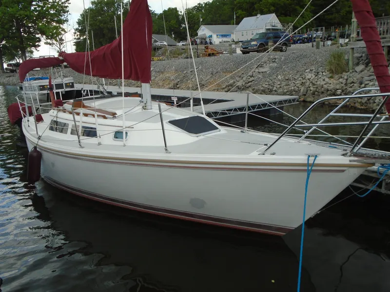 The Image of 1988 Catalina 27 sailboat docked at marina. - 0