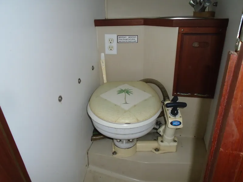 Slide: The Image of Interior of a 1988 Catalina 27 yacht with toilet. - 8