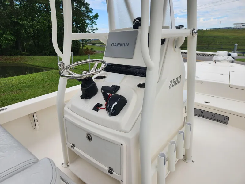 Slide: The Image of 2024 Pathfinder 2500 Hybrid boat console with Garmin navigation system. - 14