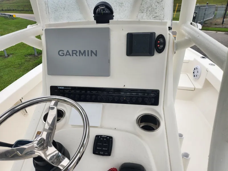 Slide: The Image of 2024 Pathfinder 2500 Hybrid boat console with Garmin navigation system. - 15