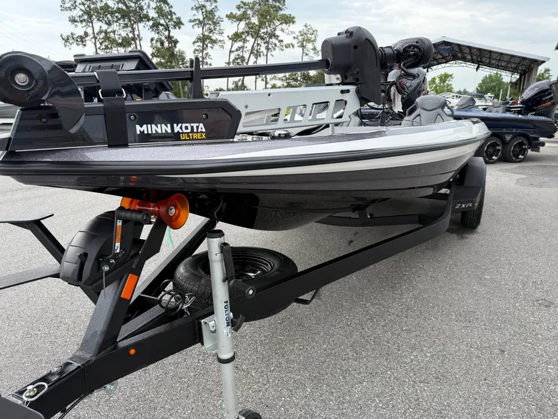 Slide: The Image of 2025 Skeeter ZXR 21 SE boat with Minn Kota Ultrex motor on trailer. - 3