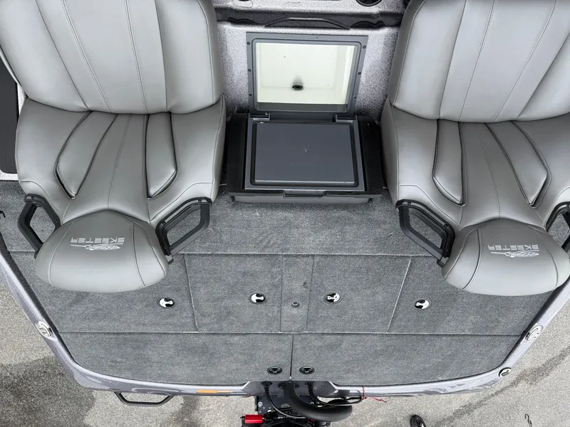 Slide: The Image of Two gray seats on a 2025 Skeeter ZXR 21 SE boat deck. - 9