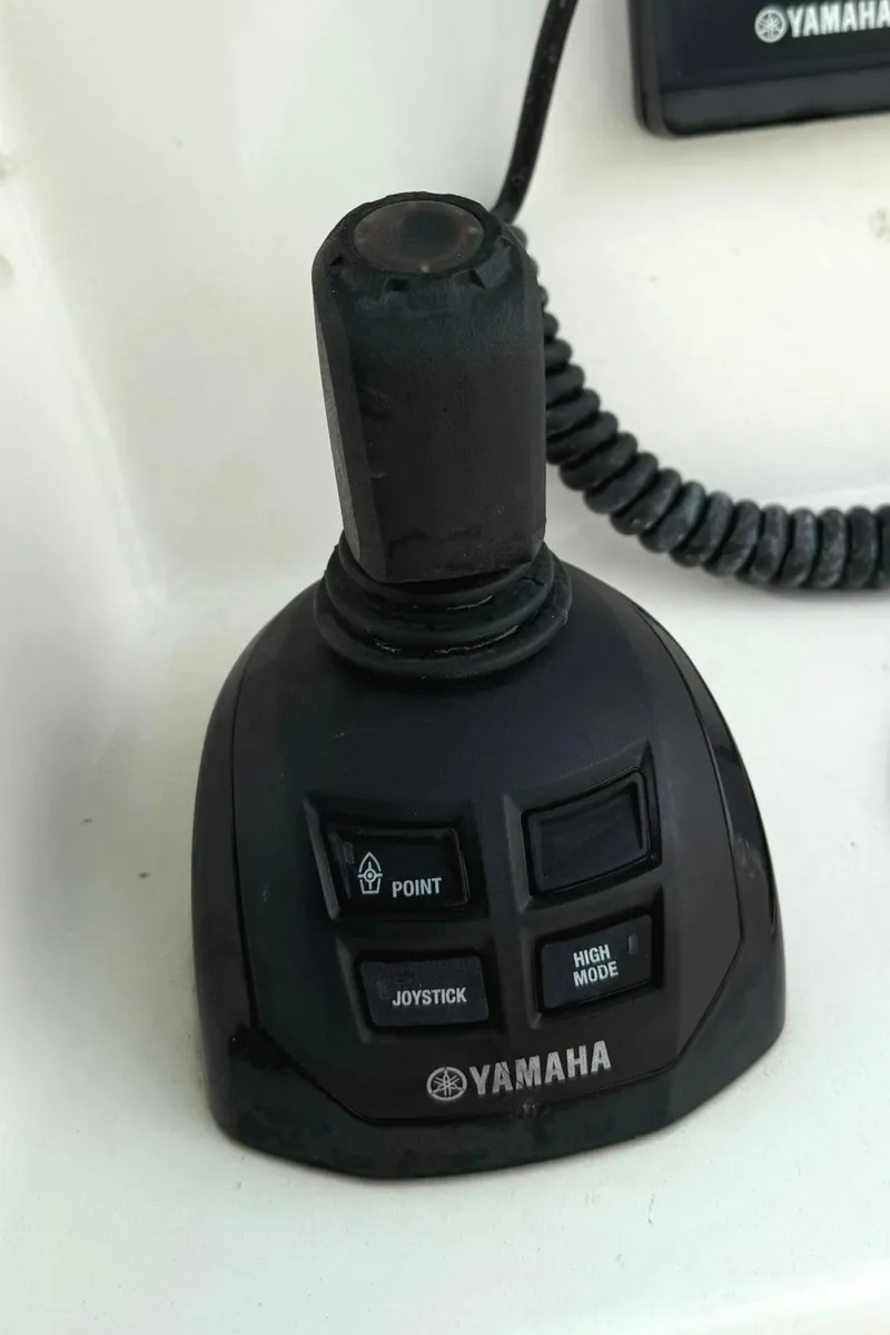 Slide: The Image of Yamaha joystick control on 2020 Cobia 320 Center Console boat. - 17