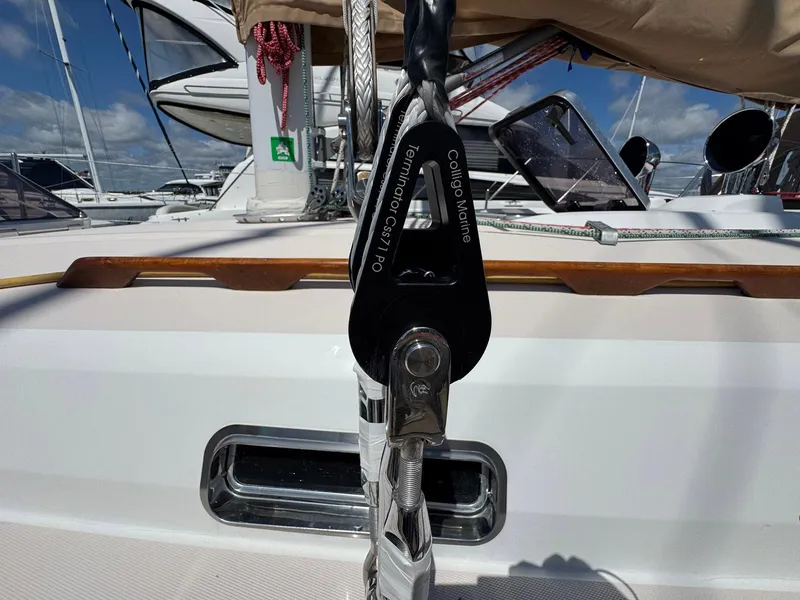 Slide: The Image of Sailing equipment on a 2000 Sabre 362 yacht, featuring a block and tackle system. - 16