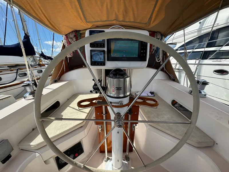 Slide: The Image of Steering wheel and navigation equipment on a 2000 Sabre 362 sailboat. - 22