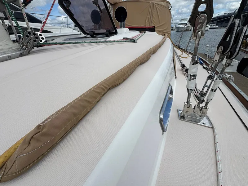 Slide: The Image of Deck view of a 2000 Sabre 362 sailboat, featuring rigging and hatch details. - 9