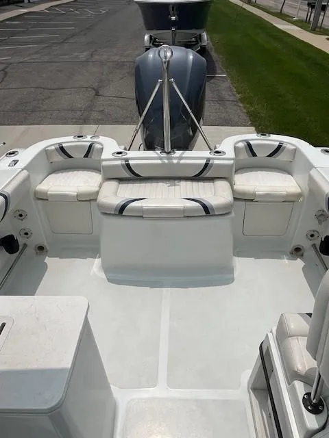 Slide: The Image of 2006 Polar Dynasty 2100 DC boat interior with seating and motor view. - 10