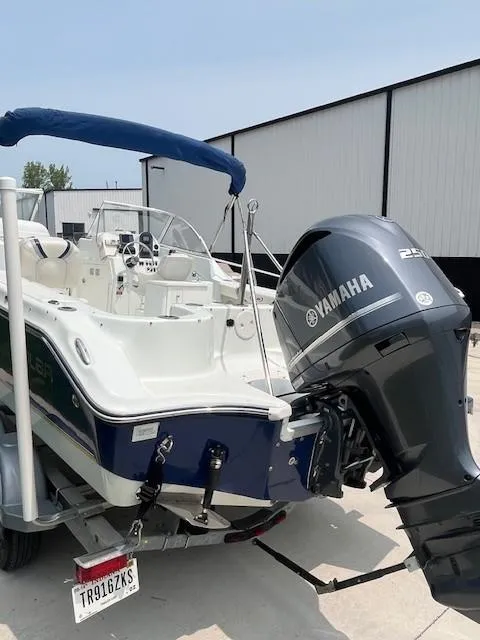 Slide: The Image of 2006 Polar Dynasty 2100 DC boat with Yamaha 250 engine, parked on a trailer. - 3