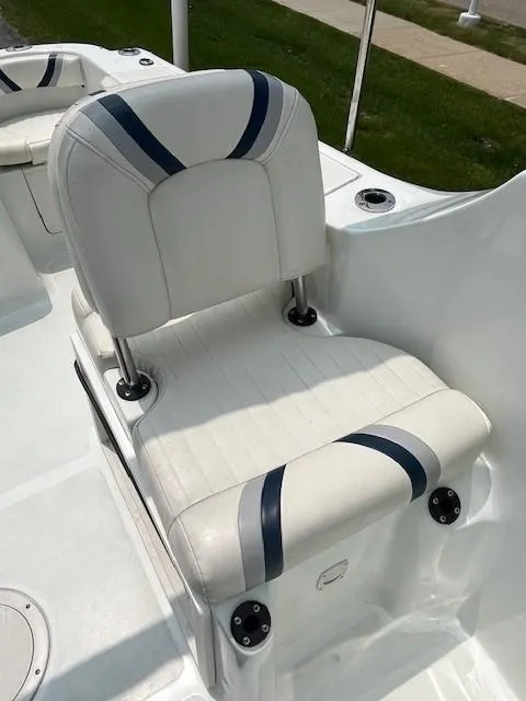 Slide: The Image of White boat seat with blue accents on a 2006 Polar Dynasty 2100 DC. - 9