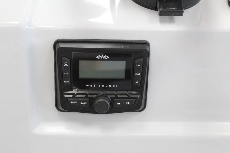 Slide: The Image of Outboard motor on a 2026 Freedom Boats Chiquita, showcasing engine details. - 13