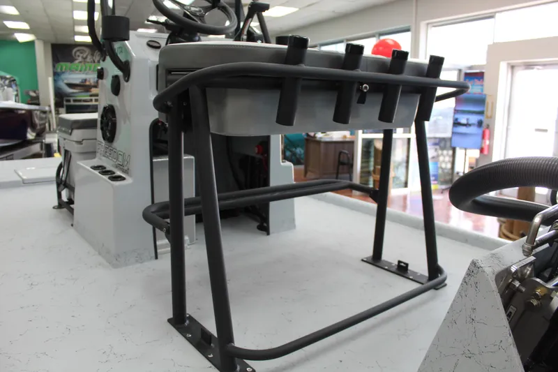 Slide: The Image of 2026 Freedom Boats Chiquita with Suzuki engine, featuring a sleek console and seating. - 7