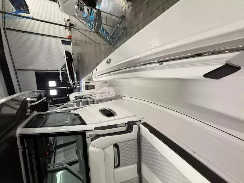 Slide: The Image of 2025 Blackfin 332 CC boat interior, showcasing sleek design and modern features. - 10