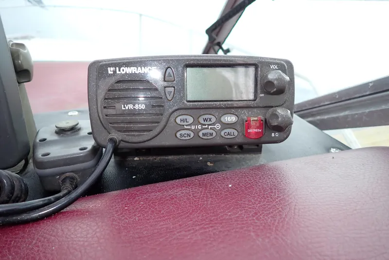 Slide: The Image of Lowrance LVR-850 marine radio on 1987 Sea Ray 300 Weekender dashboard. - 19